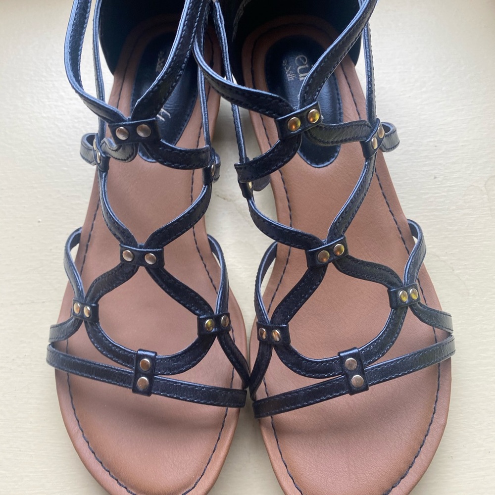 Never worn black sandals!